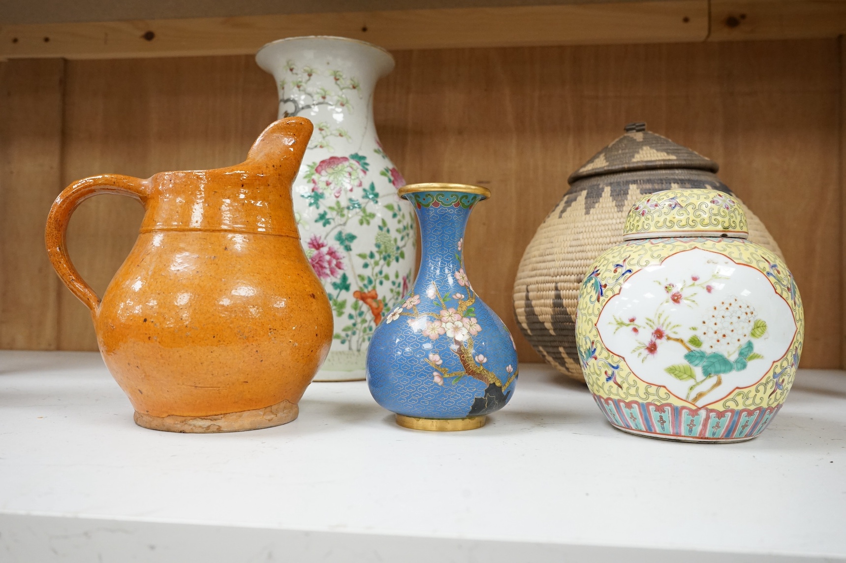 A mid 19th century Chinese famille rose vase together with other oriental and African wares, largest 33cm high. Condition - varies